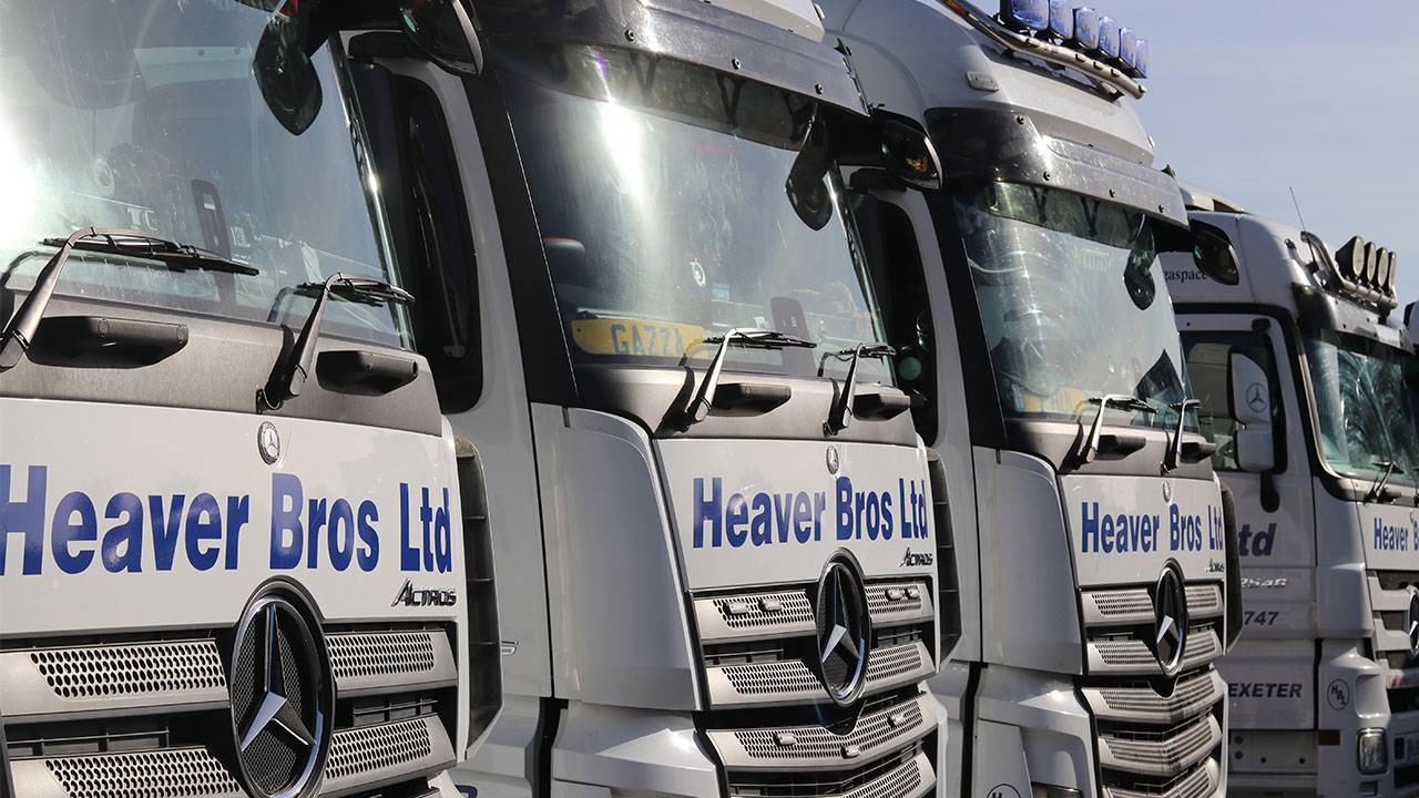 4 heaver brothers haulage trucks lined up side by side